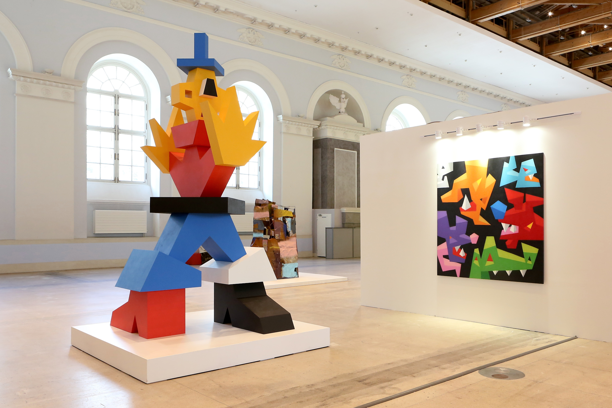 A colorful sculpture in an exhibition hall.