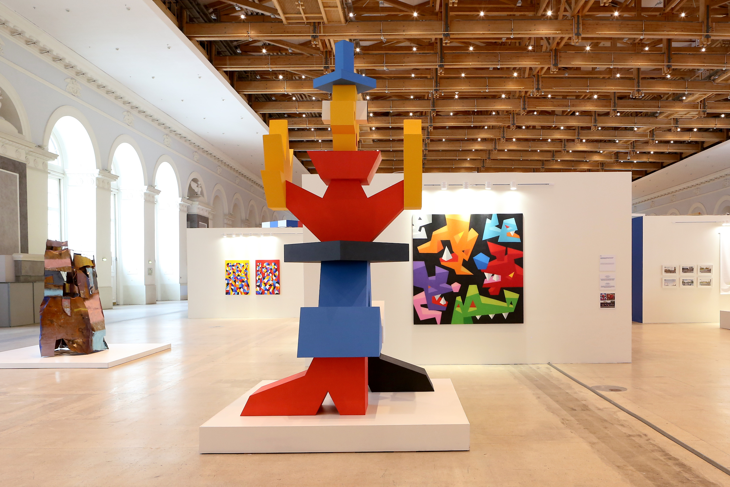 A colorful sculpture in an exhibition hall.